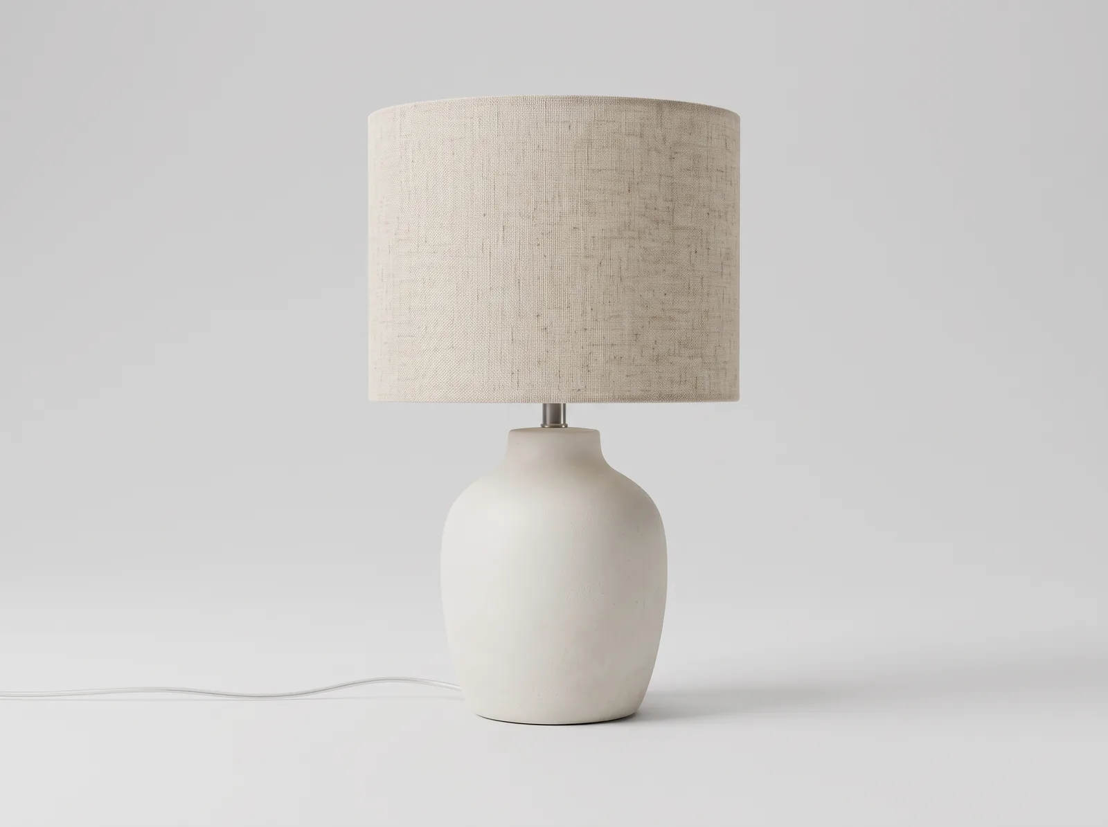 Table lamp photographed on a desk, then shown on a light-gray backdrop after an edit in ZenCreator Image Editor