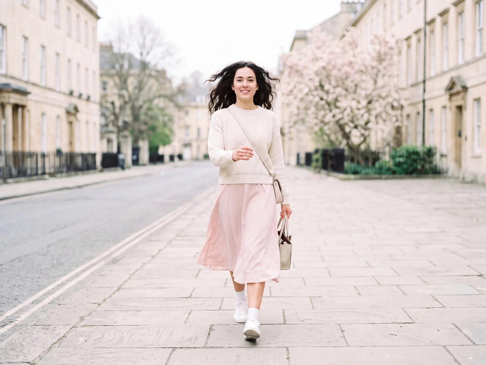 Earlier shoot photo of a woman walking down a street